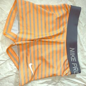 Orange and Grey Nike Pros